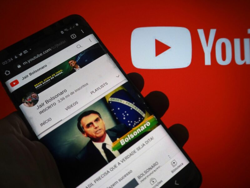 photo of a smartphone with Jair Bolsonaro's photo and youtube