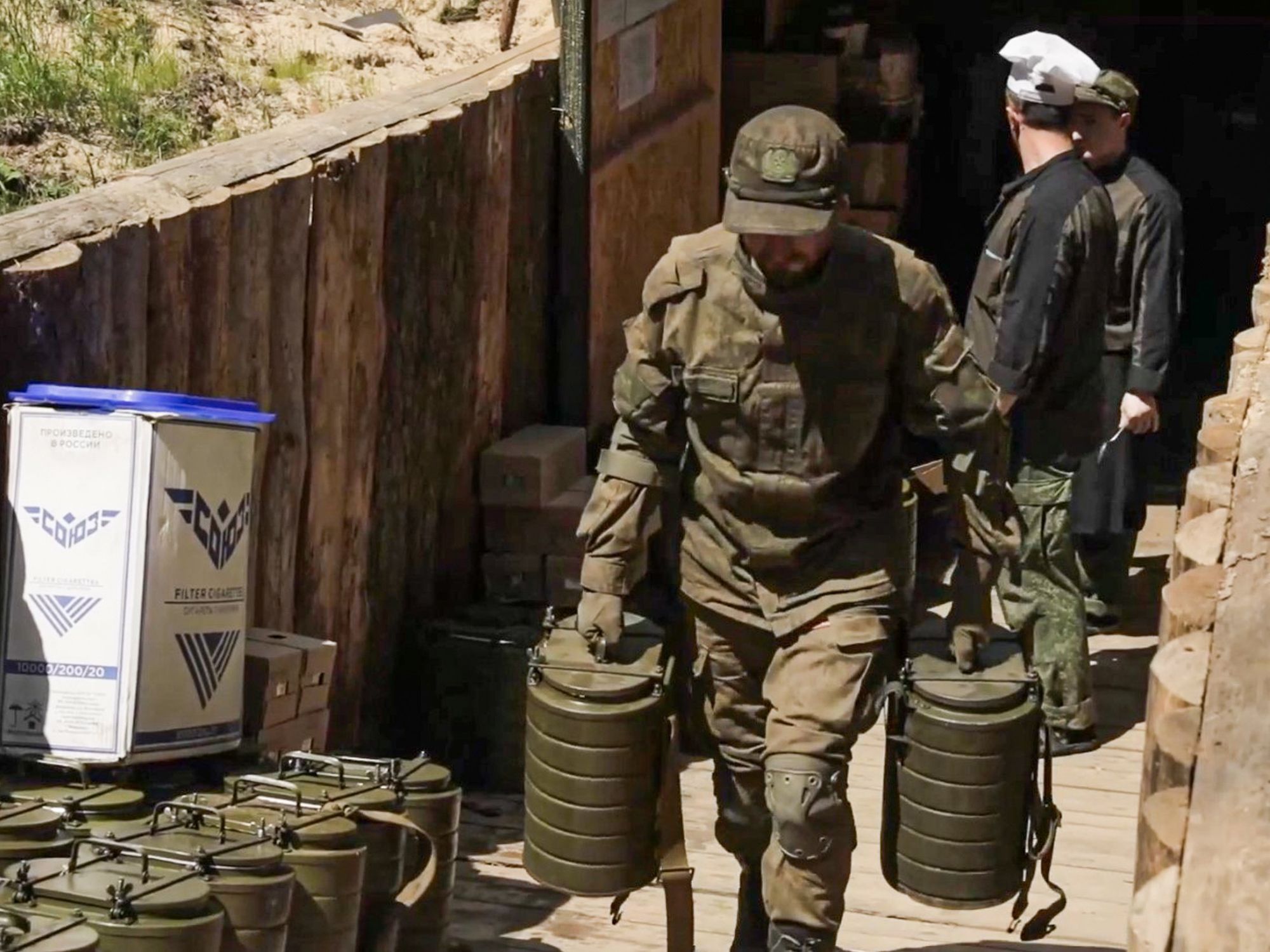 photo of a soldier carrying water