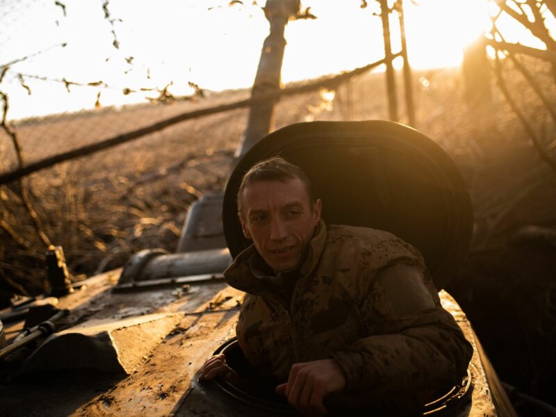 photo of a soldier coming out of a tank