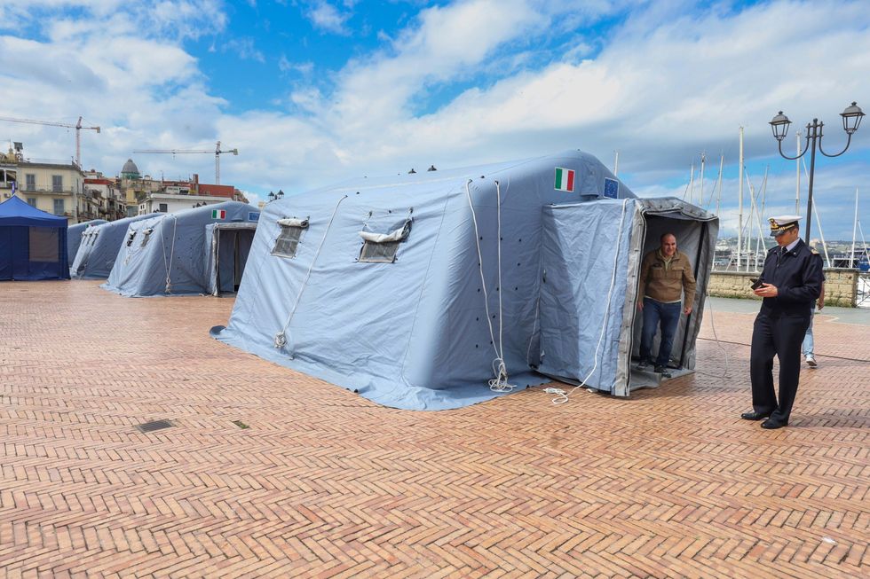 Photo of a square in Naples with tents set up on the seafront in the city of Pozzuoli after the earthquake.