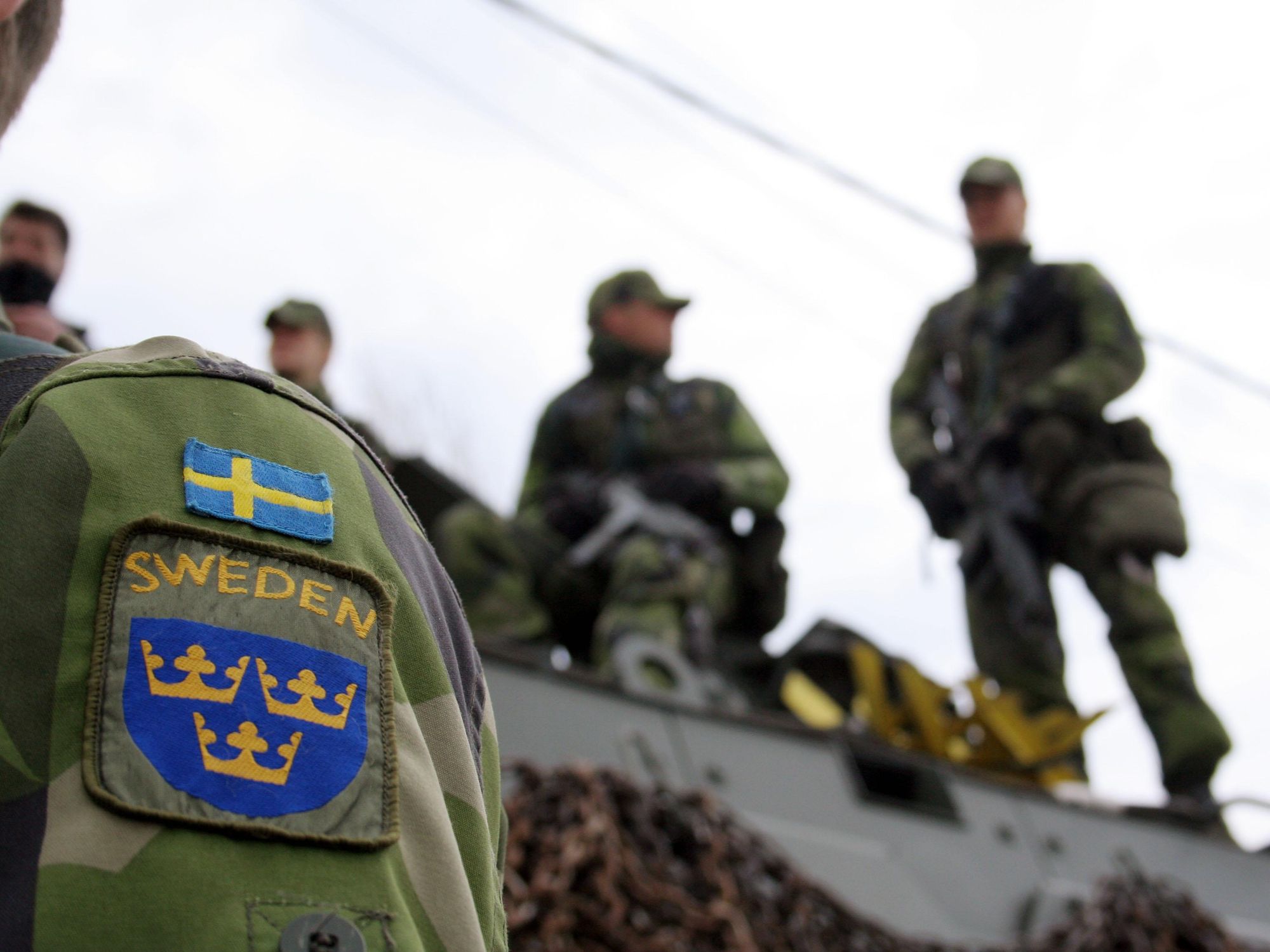 photo of a swedish soldier's uniform patches and flag
