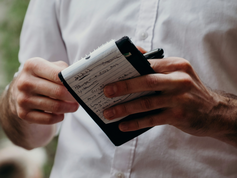 photo of a waiter and his notebook