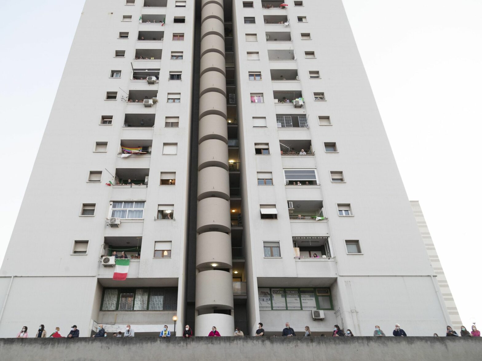 photo of a white high-rise apartment building