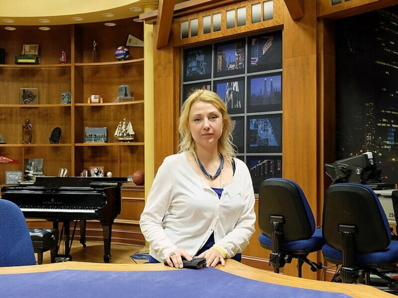 photo of a woman at a table