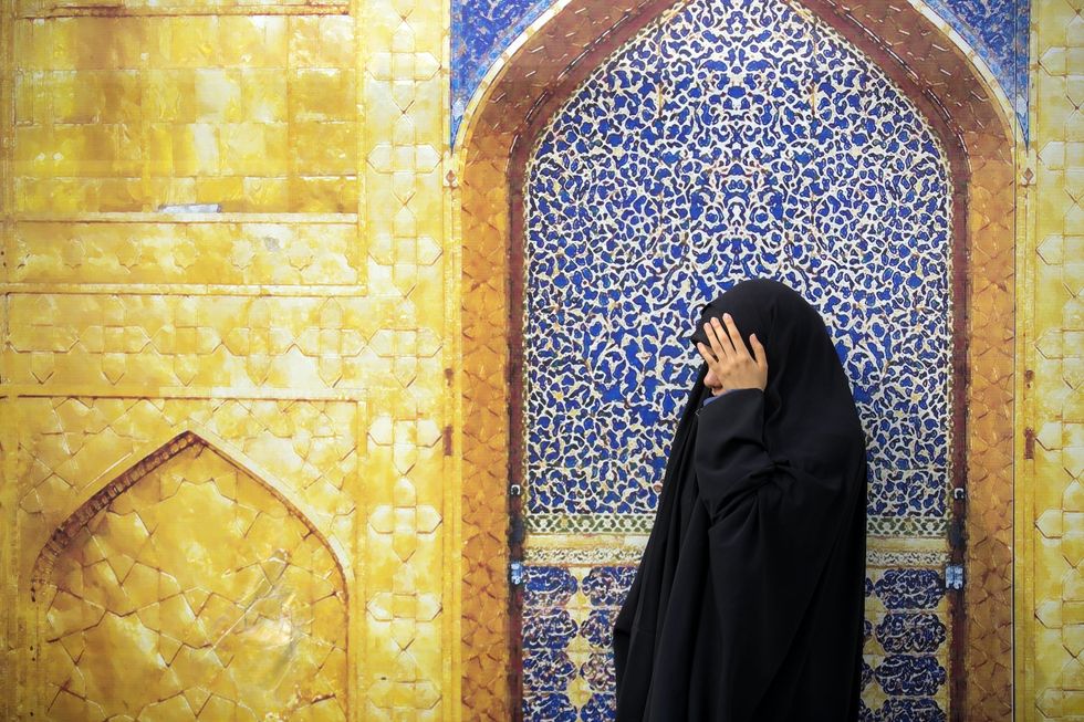 Photo of a woman in Mehran, Iran​.
