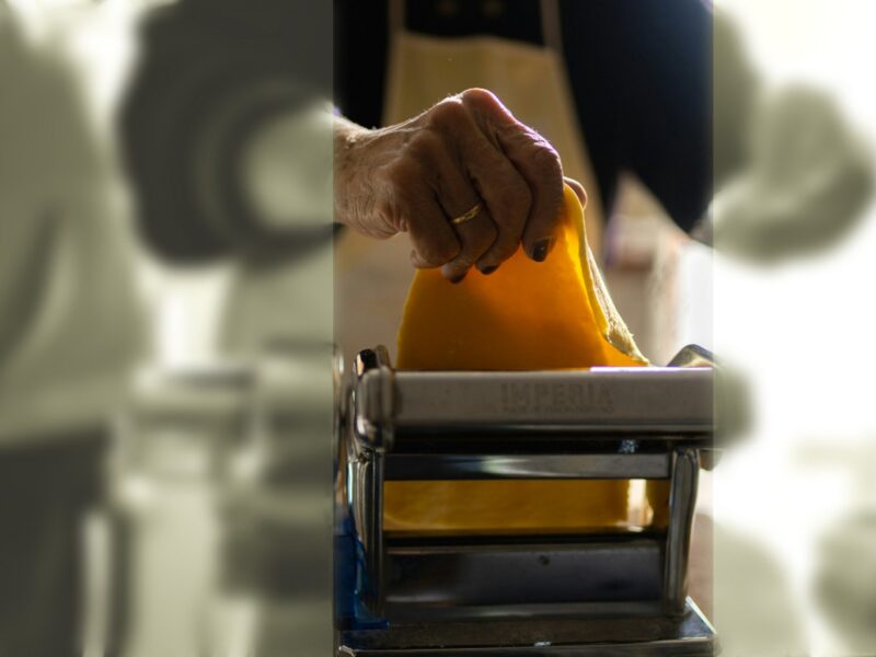 Photo of a woman making pasta