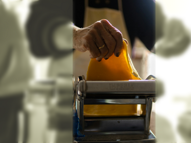 Photo of a woman making pasta