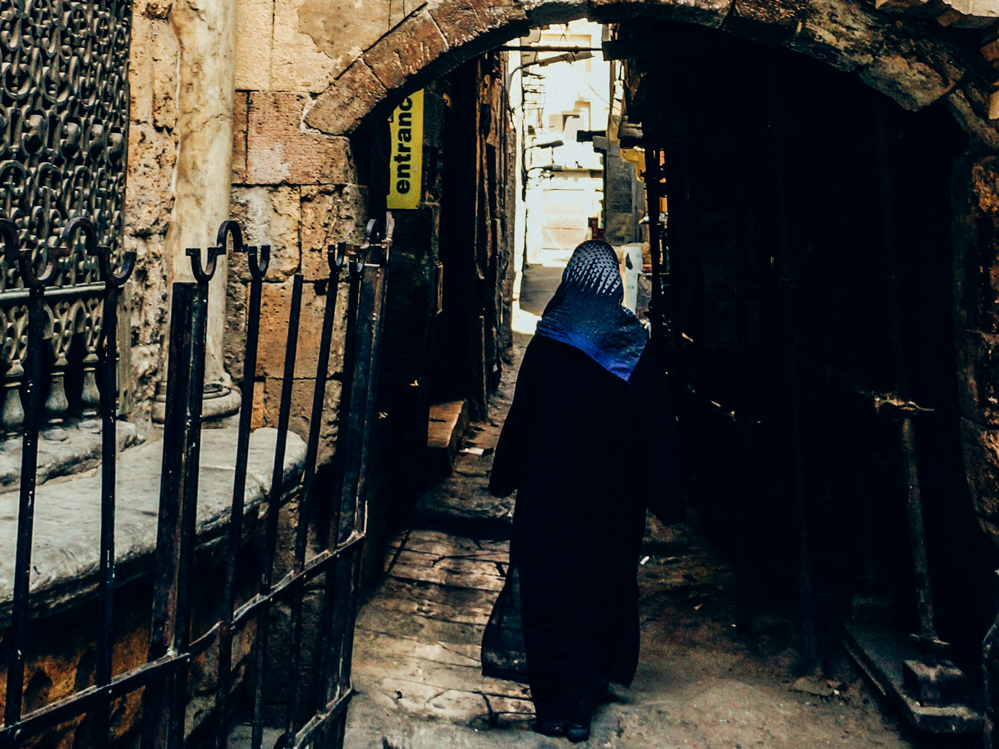 Photo of a woman walking in Cairo, Egypt.