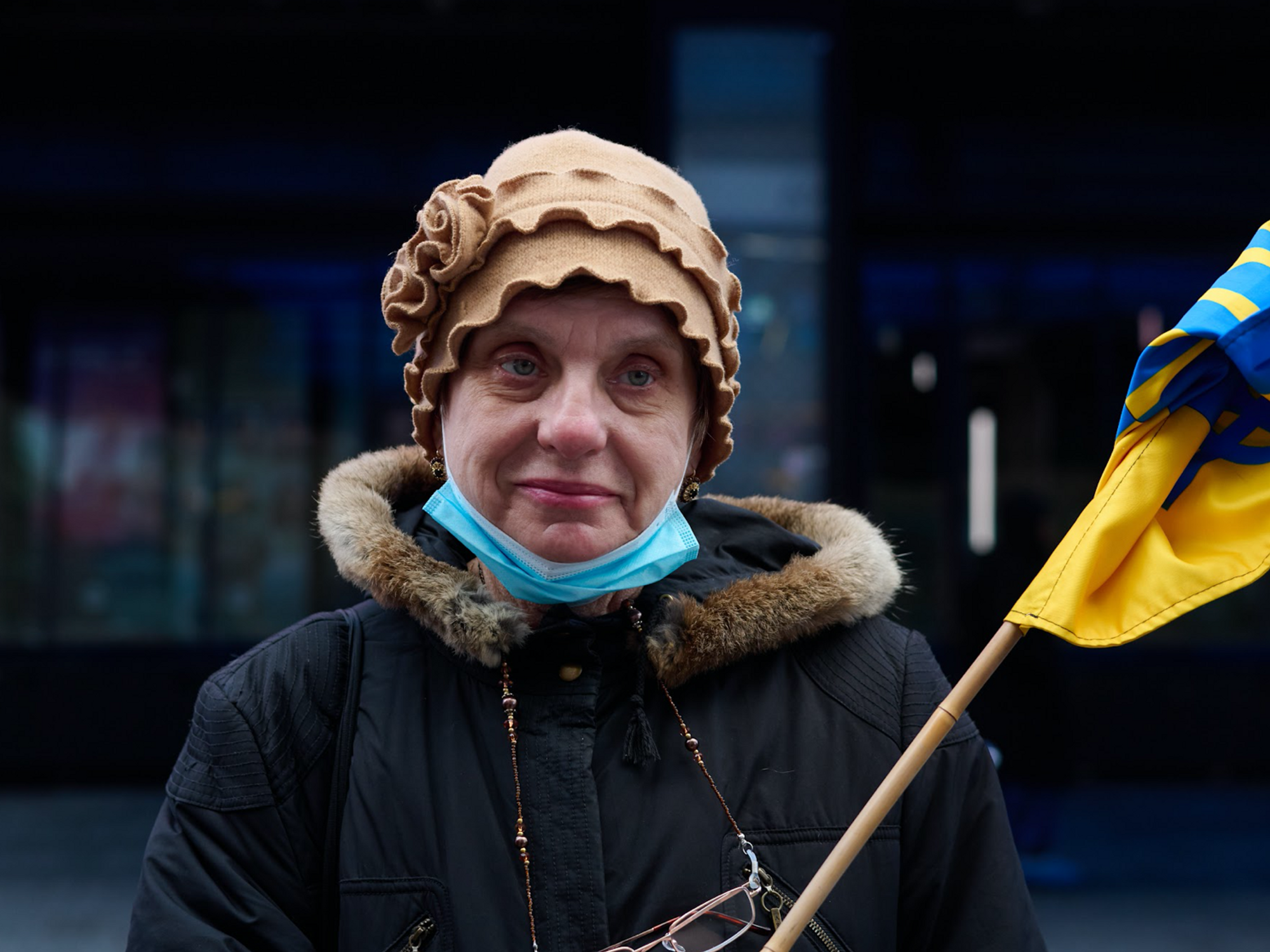 photo of a woman with a Ukraine flag