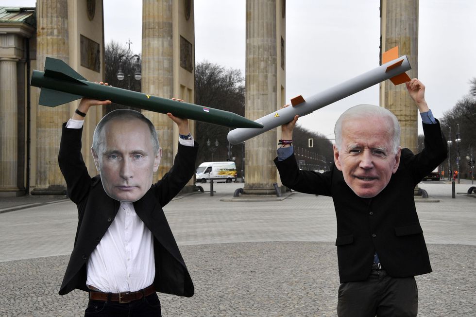 Photo of activists playfully demonstrating in Germany to the New Start Treaty agreed by Vladimir Putin and Joe Biden
