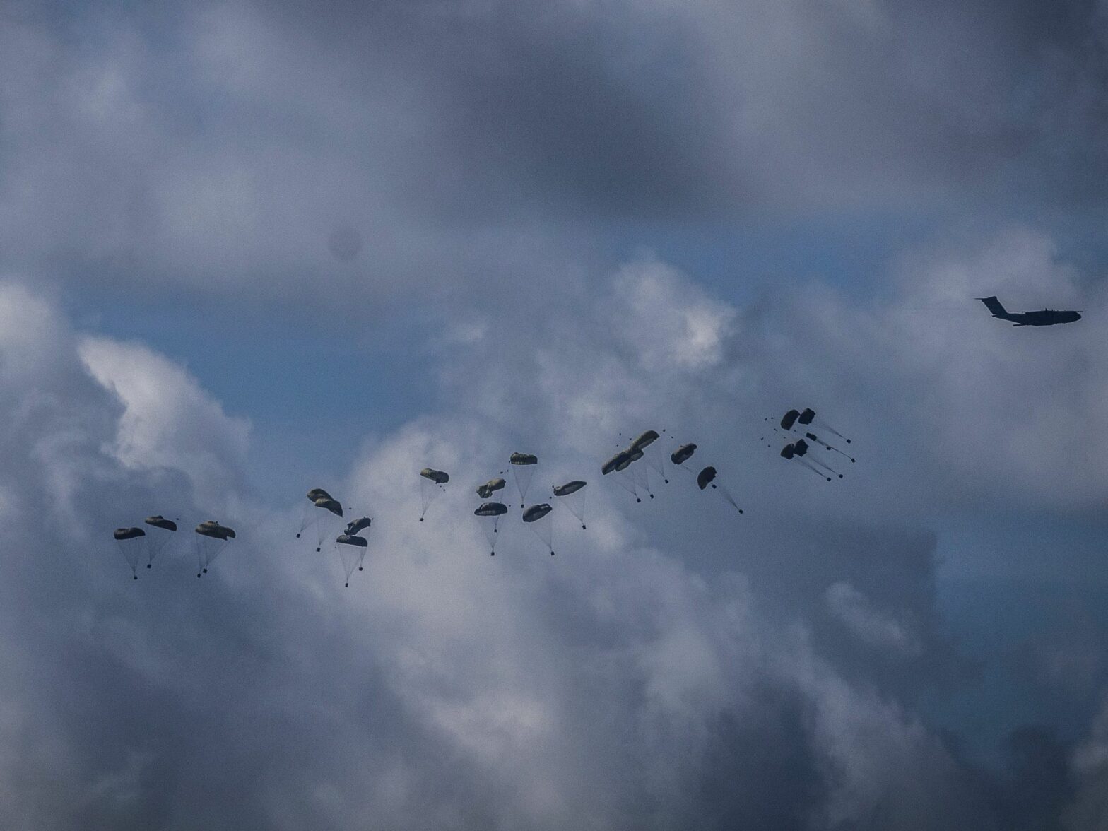 Photo of aid being dropped from the air