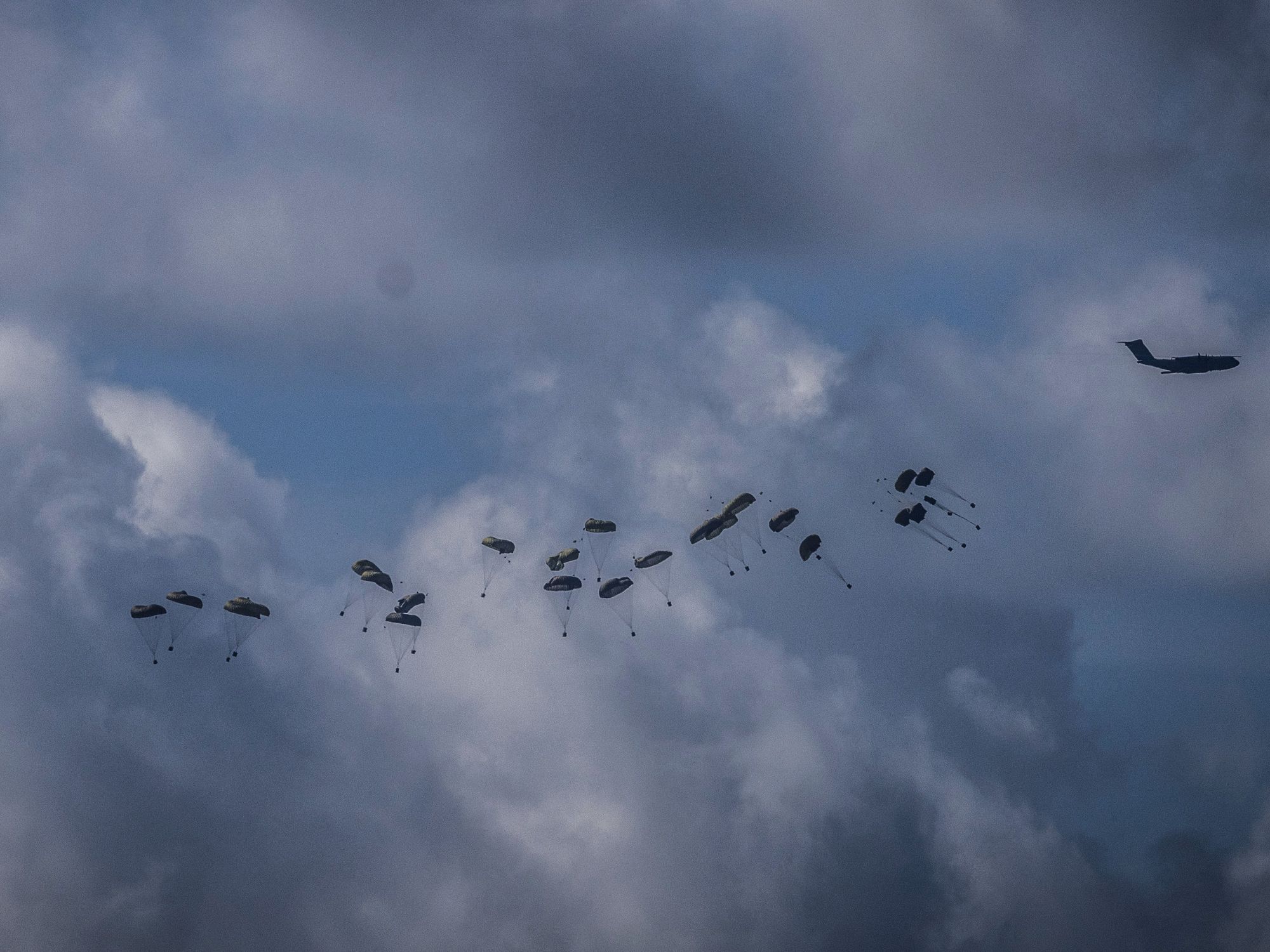 Photo of aid being dropped from the air