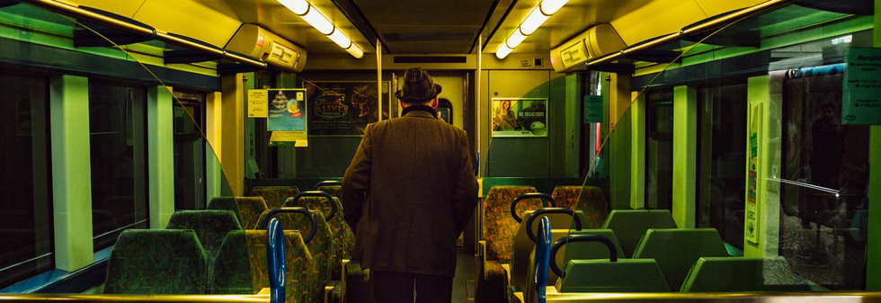 Photo of an elderly man iInside the Lisbon metro