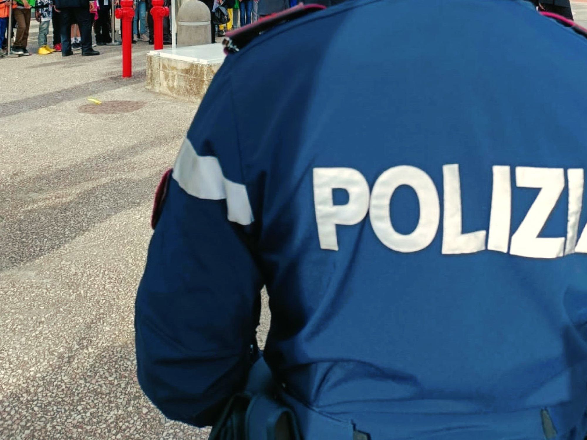 photo of an italian policeman from behind