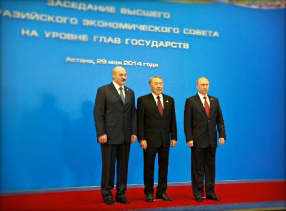 Photo of Belarusian President Lukashenko, Kazakh President Nazarbayev and Russian President Putin in Astana in May