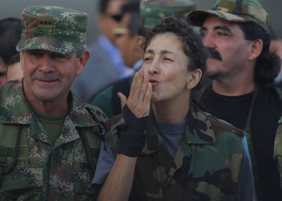 photo of Betancourt blowing a kiss