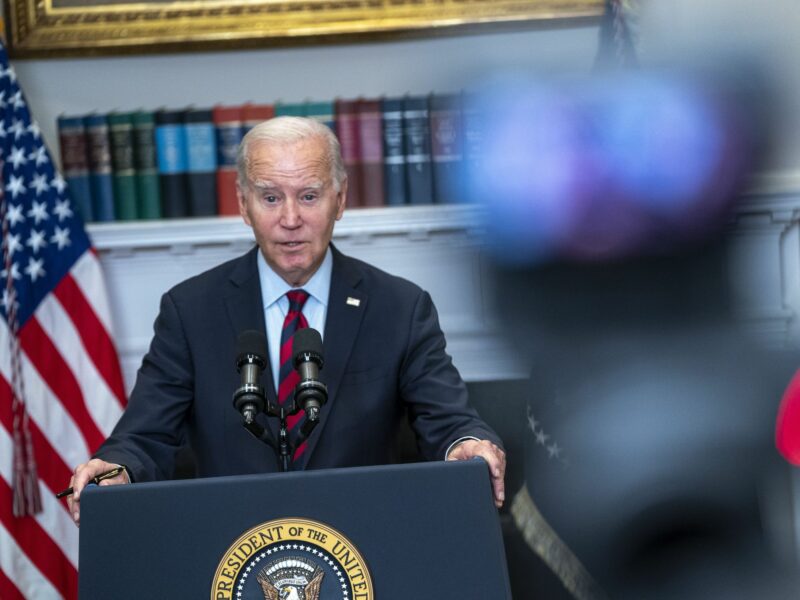 photo of biden speaking from lecturn