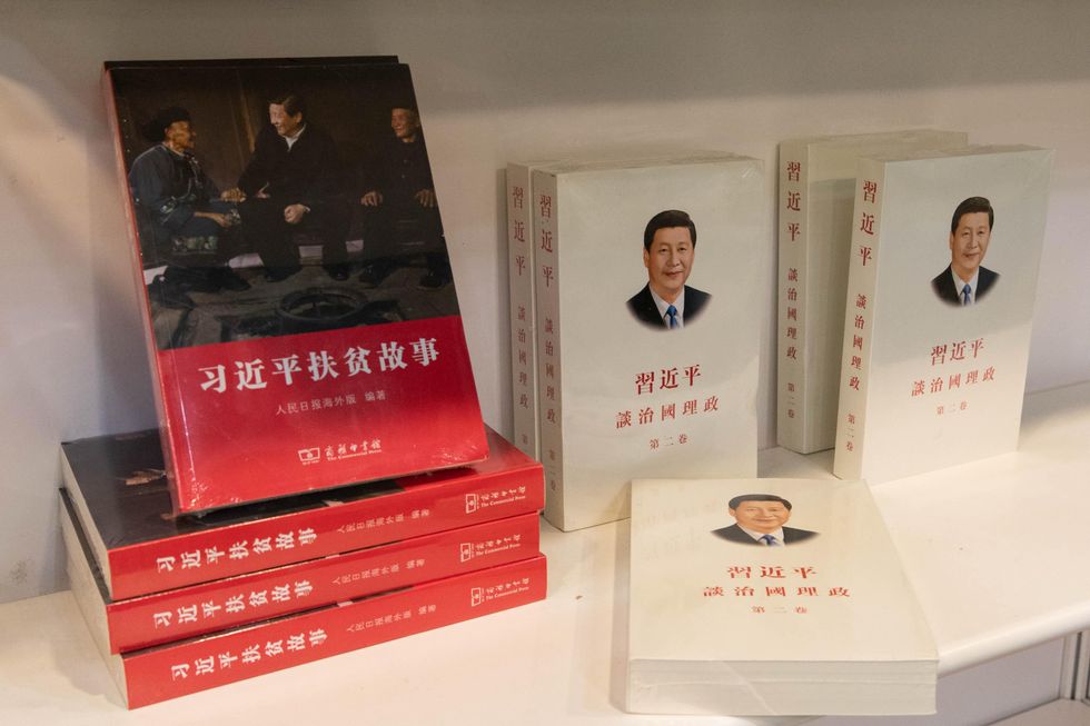 photo of books about Xi-Jinping on a shelf at the 2021 Hong Kong Book Fair