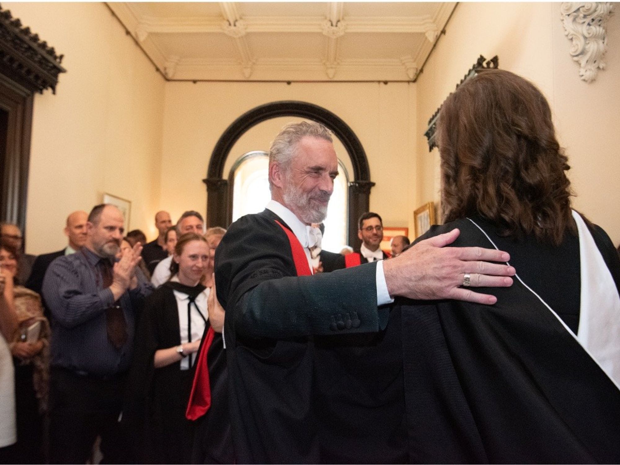 Photo of Canadian clinical psychologist Jordan B. Peterson greeting someone at Ralston College, Savannah