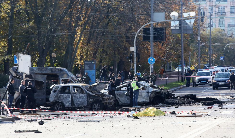 Photo of cars burnt after missile strikes in Kyiv