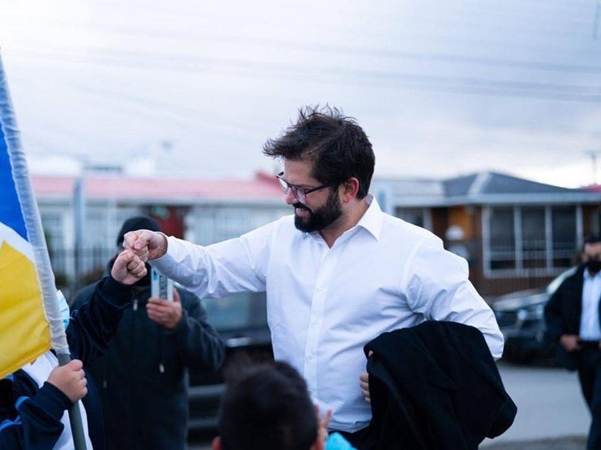 Photo of Chilean President Gabriel ​Boric fist bumping with a supporter in Magallanes, Chile, on May 5