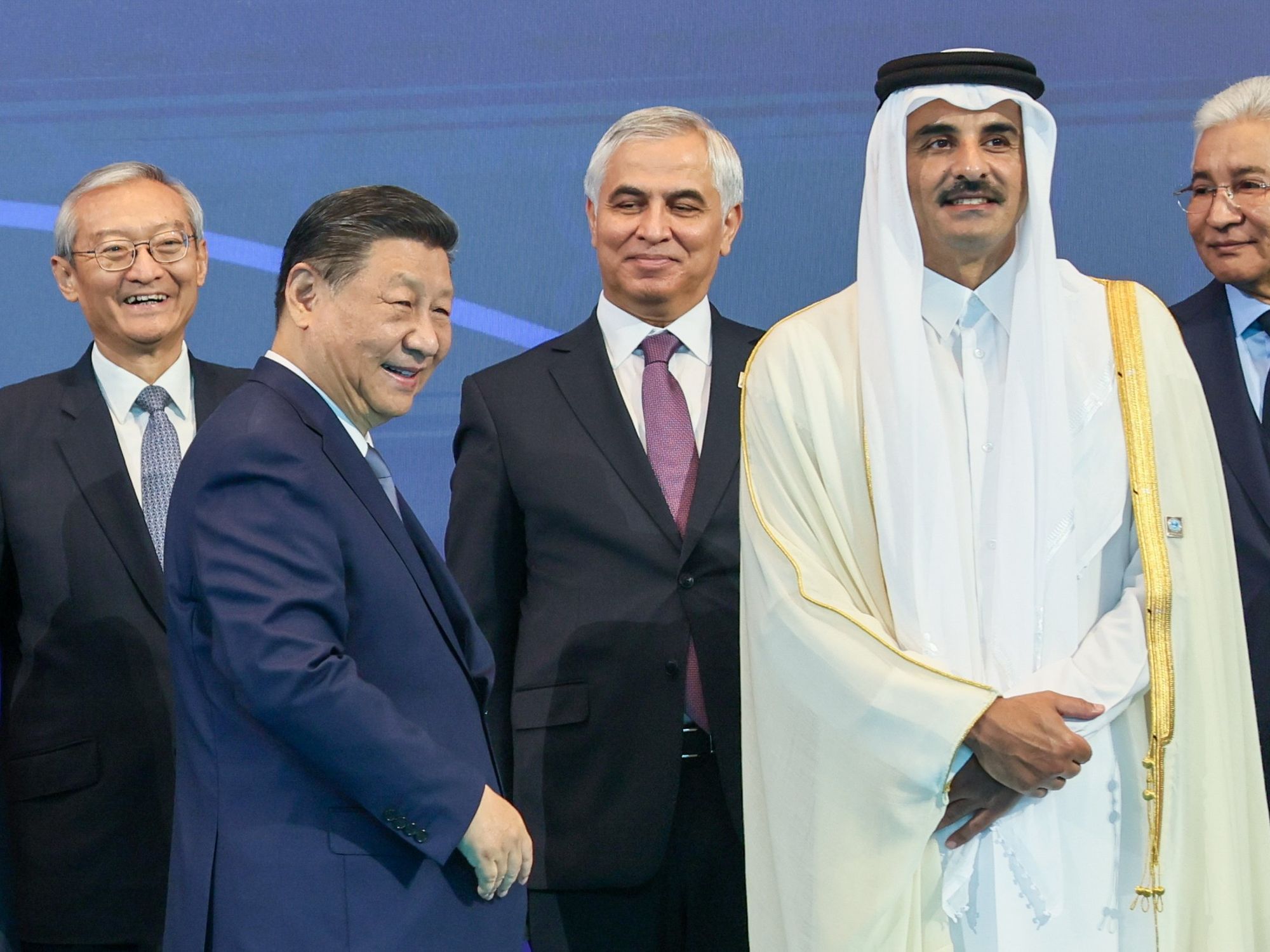 photo of Chinese President Xi Jinping, Qatar's Emir Sheikh Tamim bin Hamad Al-Thani and SCO Secretary Zhang Ming at the 2024 SCO summit of heads of state.