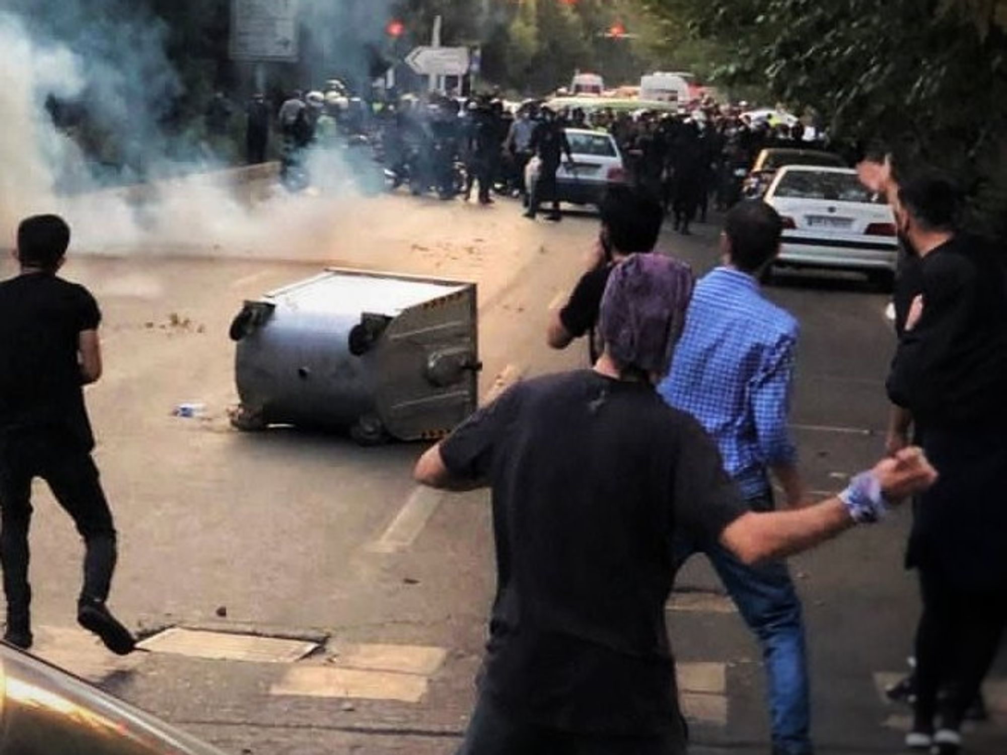 Photo of clashes between ​Iranian police and protestors on Tehran's Keshavrz Boulevard on Sept. 2022