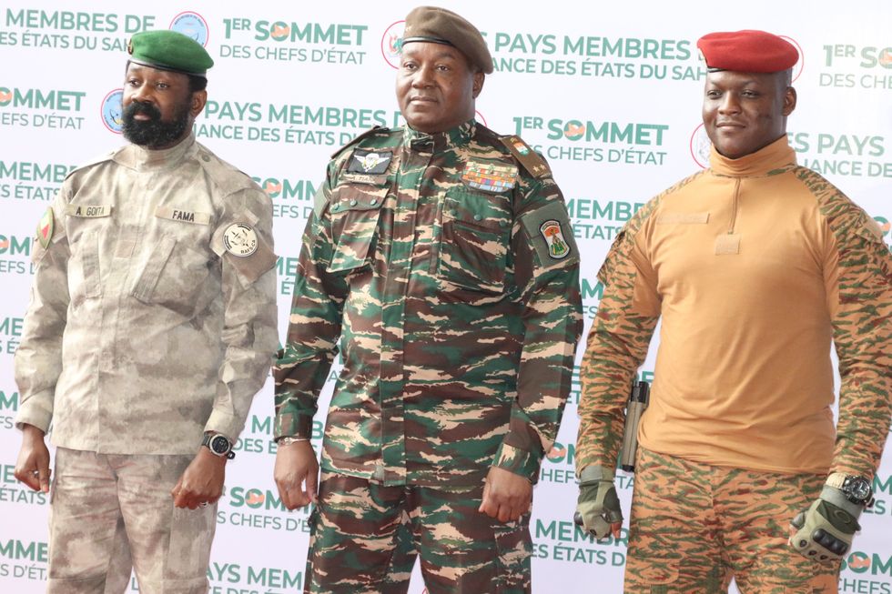 Photo of Colonel Assimi Goïta, interim president of Mali, Brigadier General Abdourahamane Tiani, interim president of Niger, and Captain Ibrahim Traoré, interim president of Burkina Faso, taking part in the first summit of the Alliance of Sahel States (AES) confederation on July 4 in Niamey, Niger.