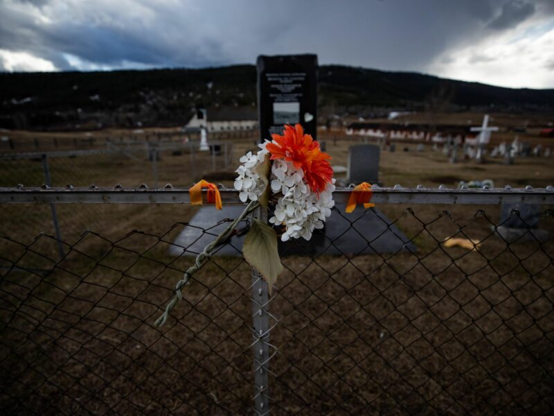 Photo of commemorative flowers on the former grounds of St. Joseph's Mission Residential School, in Williams Lake, B.C.