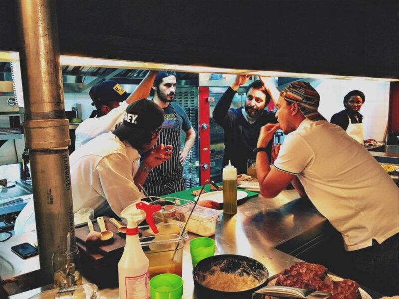 Photo of cooks in a kitchen