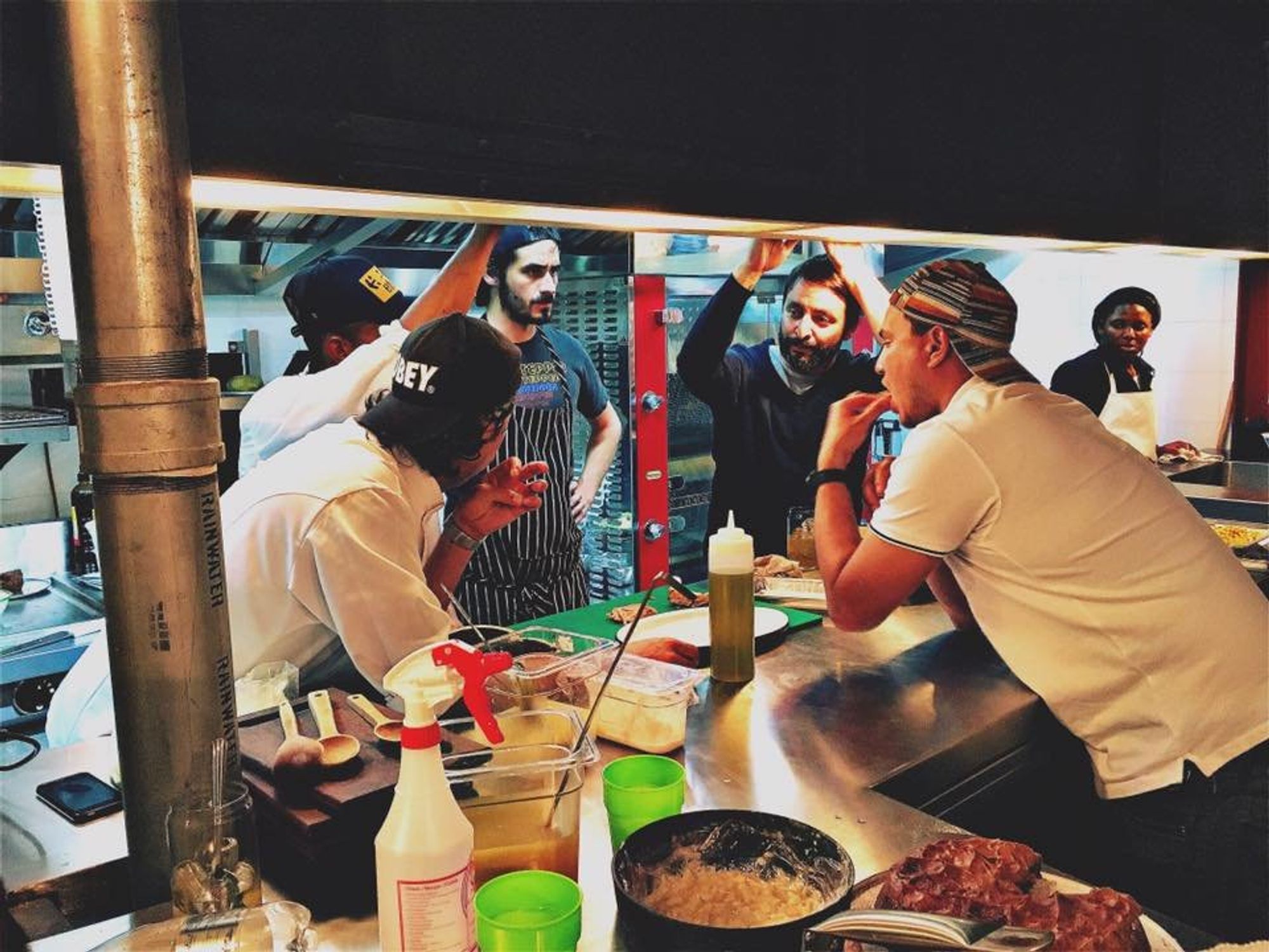 Photo of cooks in a kitchen