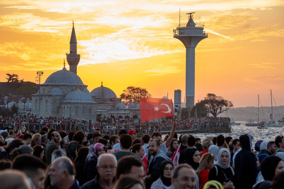 Photo of crowds near the Bosphorus in Istanbul, gathered to celebrate the 100th anniversary of the Republic of Turkey