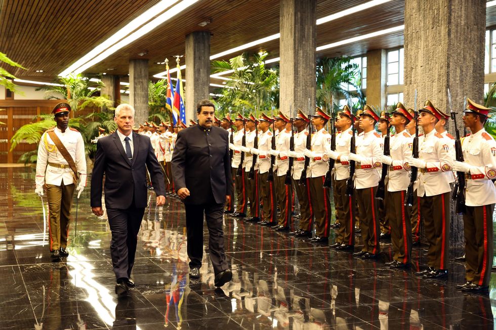 Photo of Cuban President Miguel Diaz-Cane and Venezuelan President Nicolas Maduro