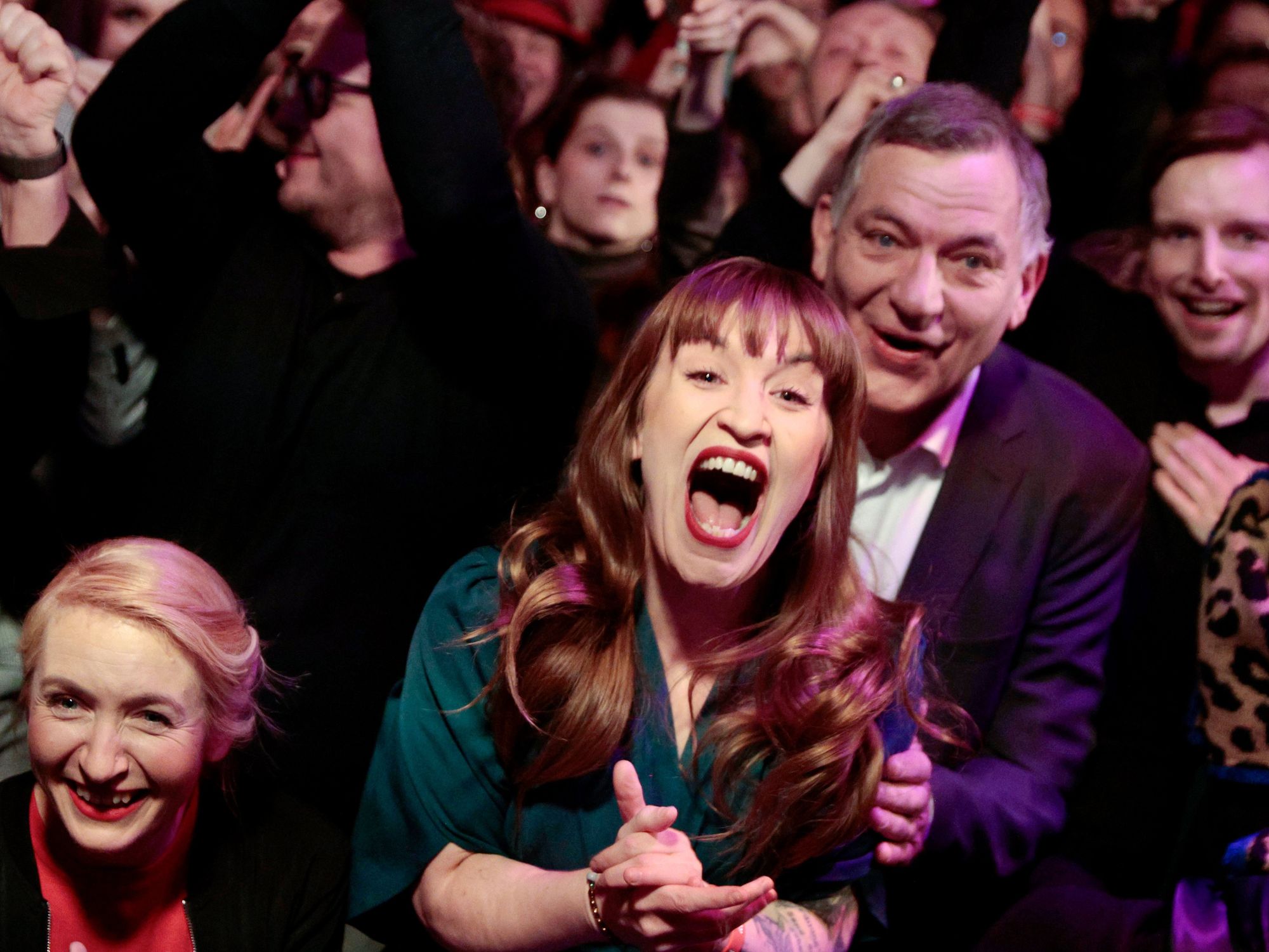 Photo of Die Linke chairwoman Ines Schwerdtner, leader Heidi Reichinnek (center) and chaimman Jan van Aken (right) rejoice after election results in Berlin on Feb. 23