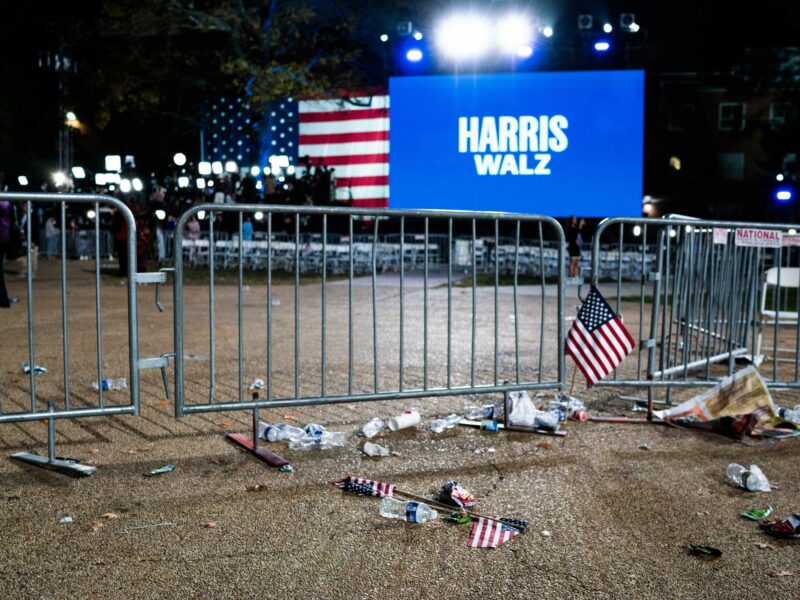 Photo of discarded U.S. flags at a Kamala Harris support gathering abandoned after former President Donald Trump won the election.