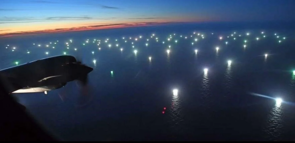 Photo of dozens of boats parked 201 miles off the coast of Comodoro Rivadavia