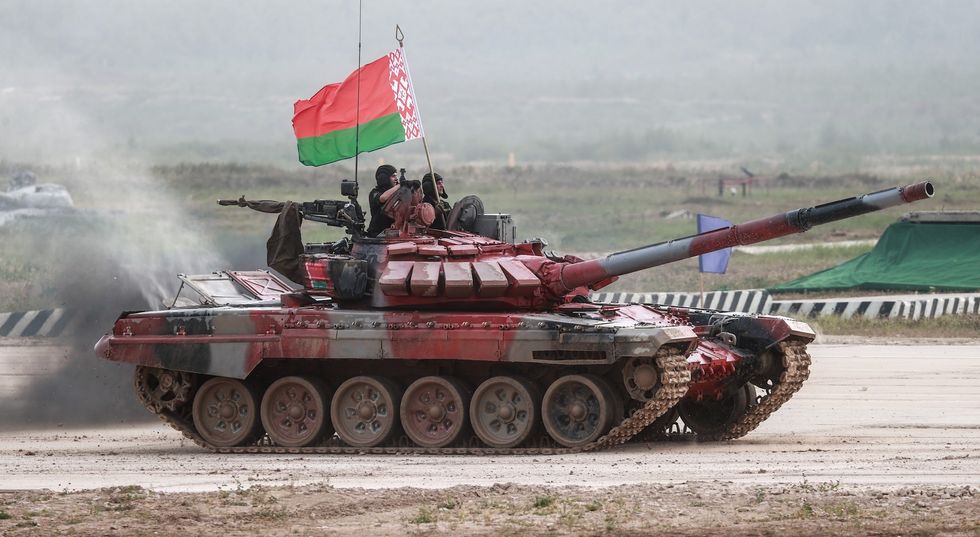 Photo of ​a T-72BME tank crew of Belarus competing in the finals of the Tank Biathlon competition as part of the 2022 International Army Games at the Alabino training range.