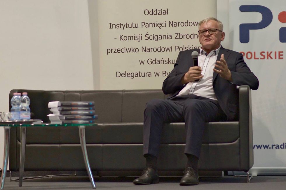 Photo of ​Antoni Tokarczuk speaking at a conference