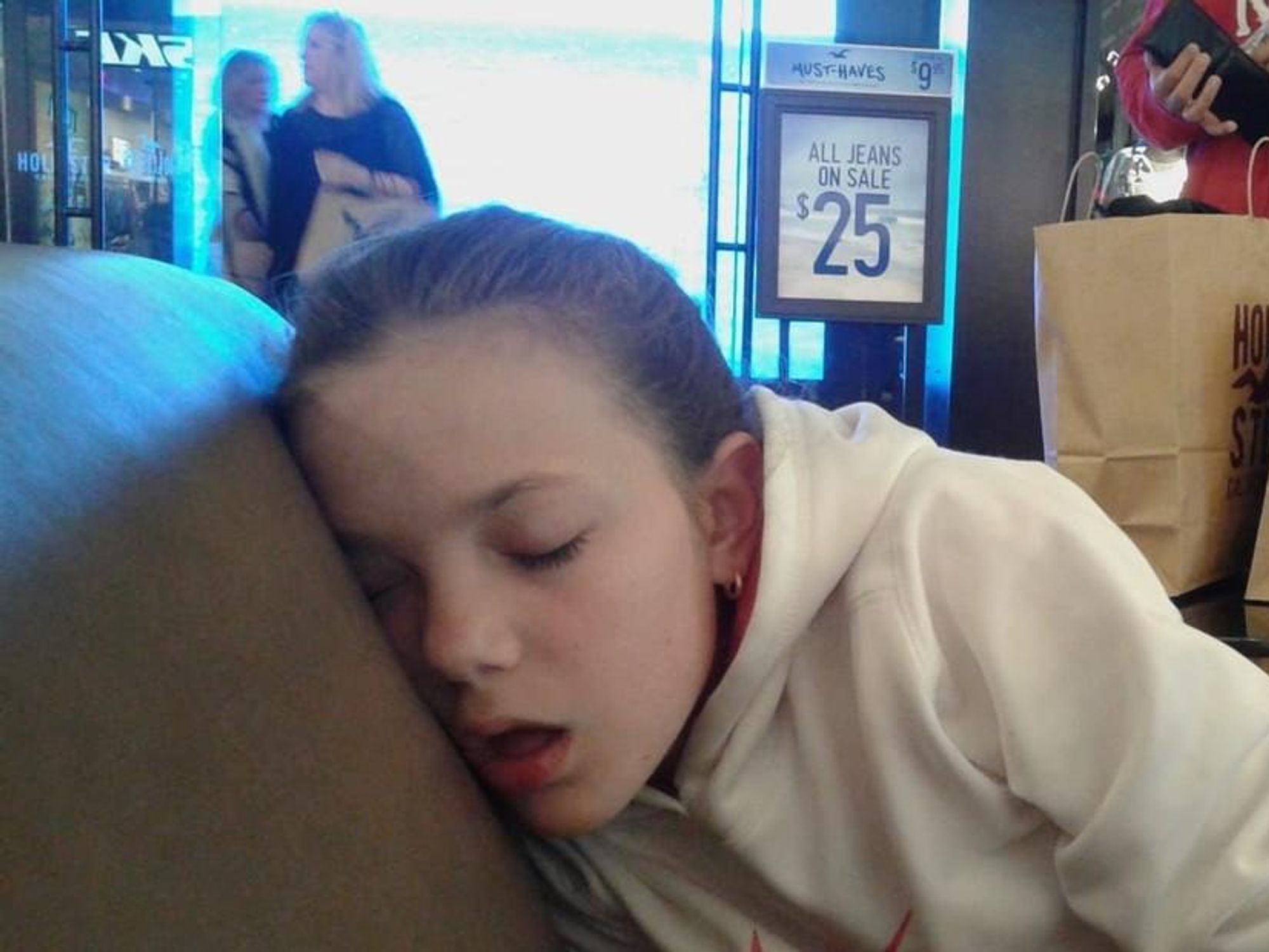 Photo of ​Chiara Torruella, 19, sleeping in a store