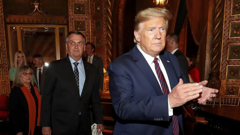 Photo of ​Donald Trump and Brazilian President Jair Bolsonaro at a Mar-a-Lago dinner in 2021