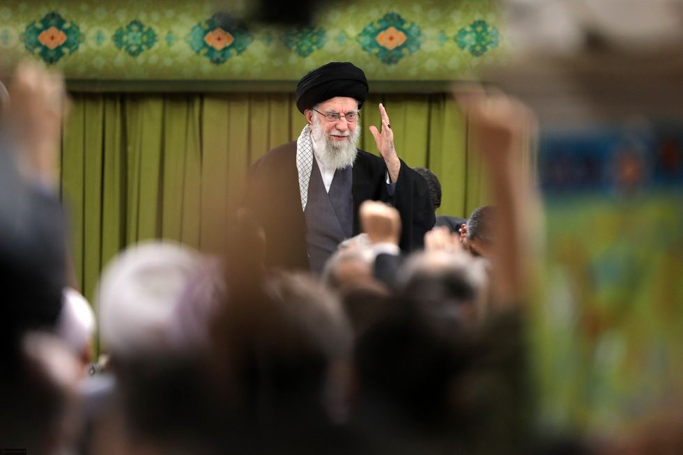 photo of ​​Iranian Supreme Leader Ayatollah Ali Khamenei waving