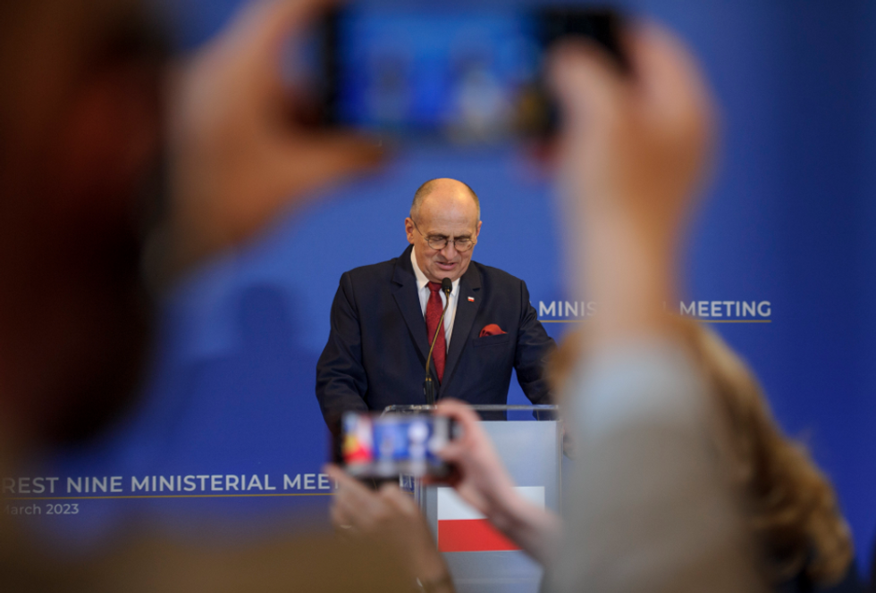 Photo of ​Polish foreign minister Zbigniew Rau speaking in Warsaw on March 31
