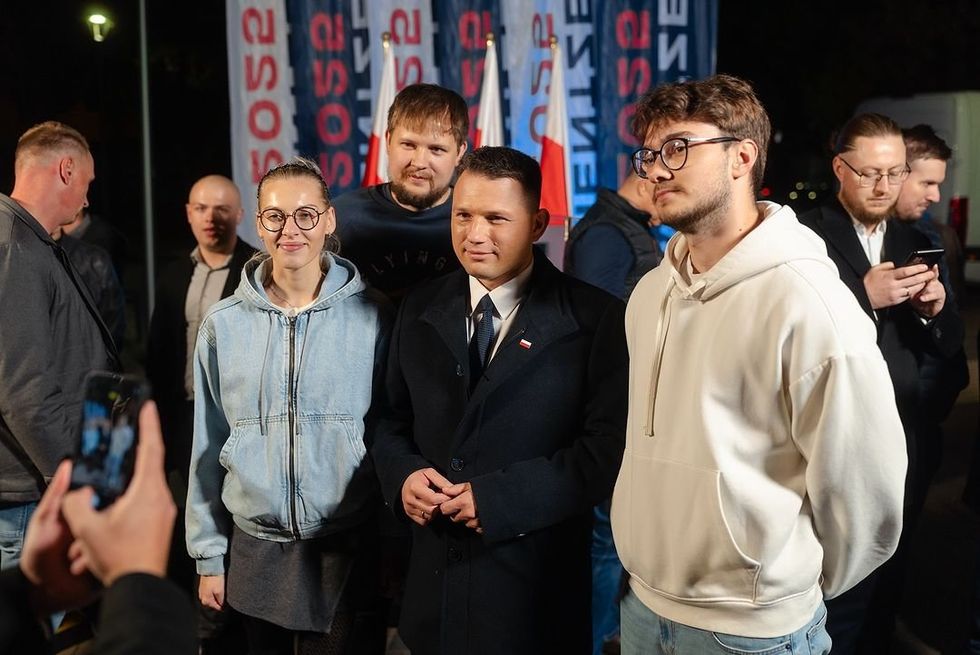 Photo of ​Sławomir Mentzen, Member of the Sejm of the Republic of Poland posing for a photo after a speech in Ełk, Poland, Oct. 11, 2024.