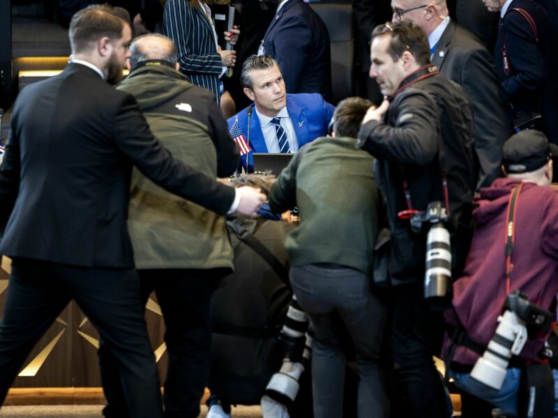 photo of ​U.S. Defense Secretary Pete Hegseth surrounded by photographers