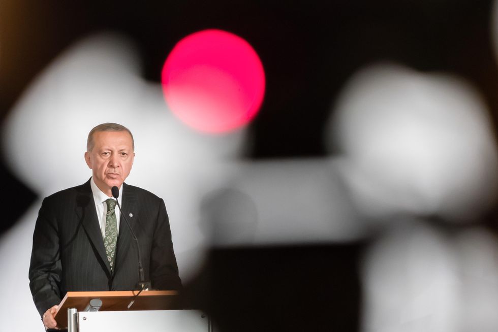 photo of Erdogan at a lecturn