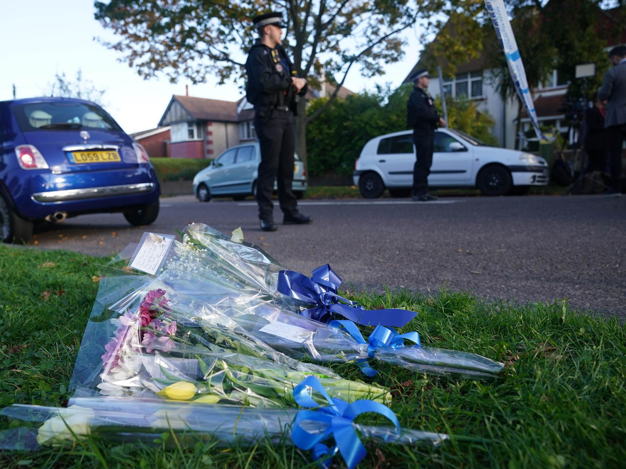 Photo of flowers in tribute to slain UK MP David Amess in ​Leigh-on-Sea on Oct. 15