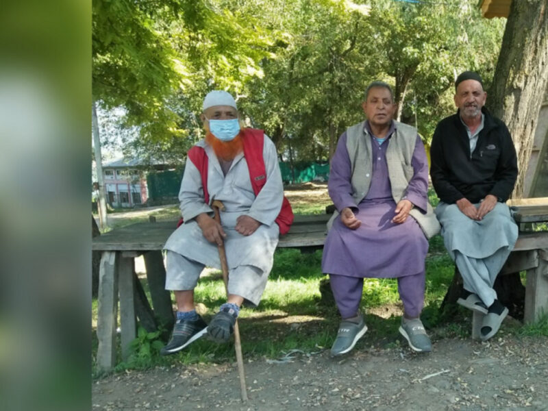 Photo of four men in the leper colony