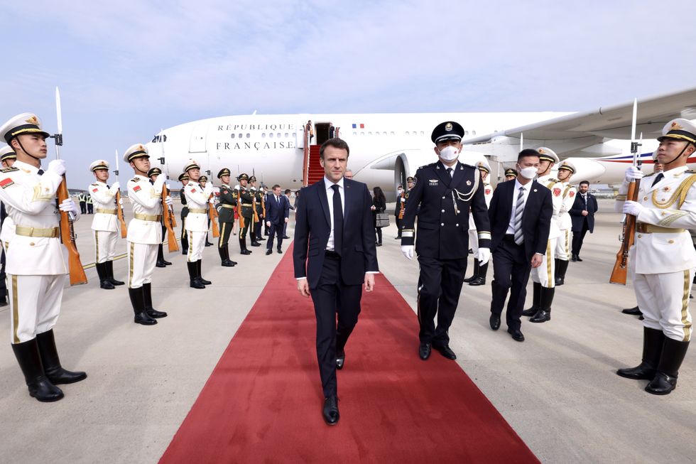 Photo of French president Emmanuel Macron arriving in Beijing