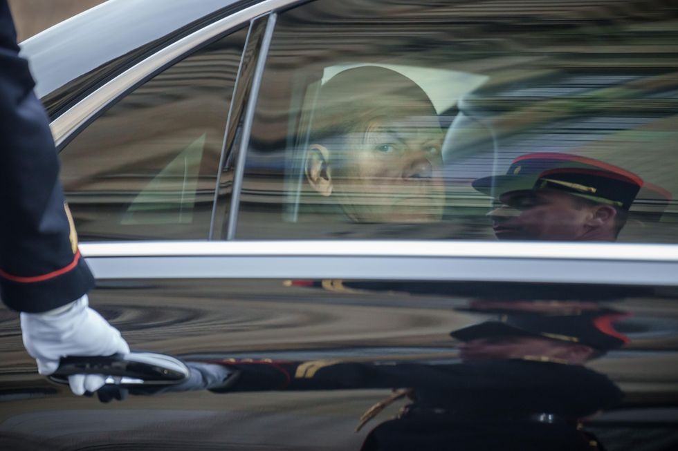 Photo of German Chancellor Olaf Scholz in a car.