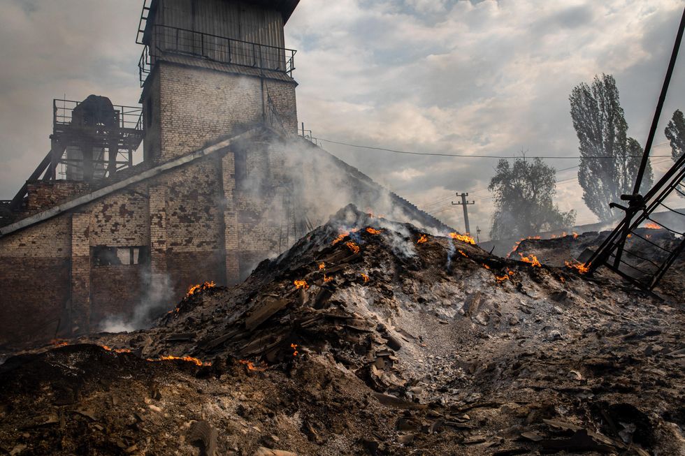 Photo of grain burning near ​destroyed silos in Sivers'k, Ukraine